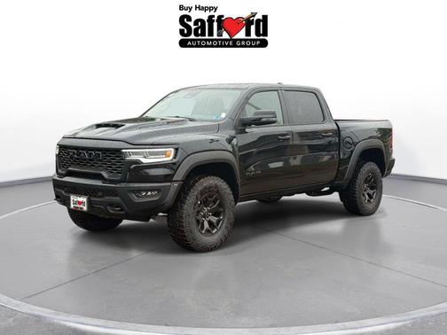 Diamond Black Crystal Pearlcoat 2026 RAM 1500 RHO Crew Cab 4x4 5'7' Box