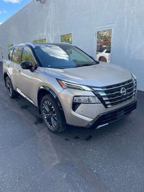 Champagne Silver Metallic/Super Black 2024 Nissan Rogue Platinum