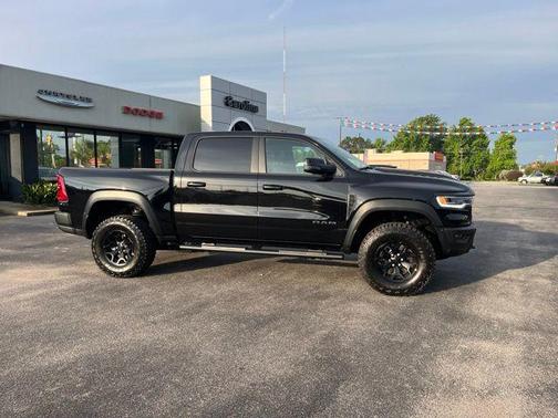 Diamond Black Crystal Pearlcoat 2026 RAM 1500 RHO Crew Cab 4x4 5'7' Box