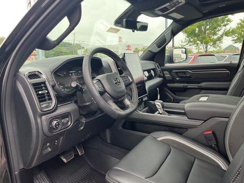 Diamond Black Crystal Pearlcoat 2026 RAM 1500 RHO Crew Cab 4x4 5'7' Box