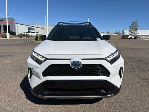 Wind Chill Pearl/Midnight Black Metallic 2023 Toyota RAV4 Hybrid SE