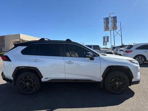 Wind Chill Pearl/Midnight Black Metallic 2023 Toyota RAV4 Hybrid SE