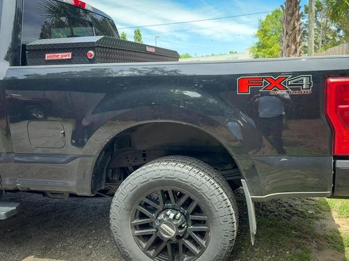 Black 2019 Ford F-250 Lariat 4WD Crew Cab 6.75' Box