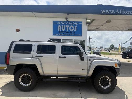Tan 2006 Hummer H3 Base