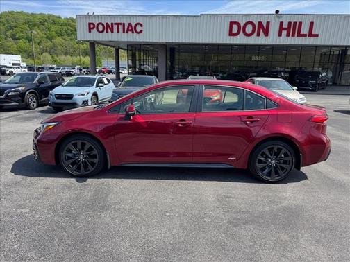 Ruby Flare Pearl 2025 Toyota Corolla Hybrid SE