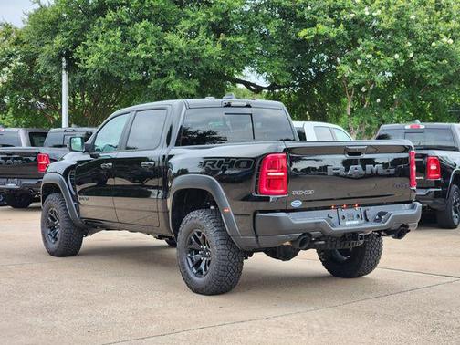 Diamond Black Crystal Pearlcoat 2026 RAM 1500 RHO Crew Cab 4x4 5'7' Box