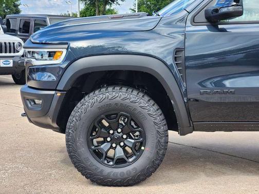Forged Blue Metallic 2026 RAM 1500 RHO Crew Cab 4x4 5'7' Box