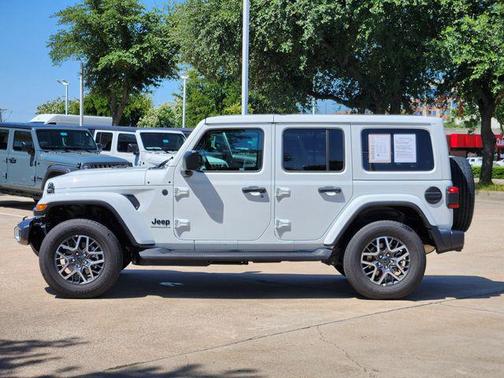 bright white clearcoat 2026 Jeep Wrangler 4-Door Sahara 4x4