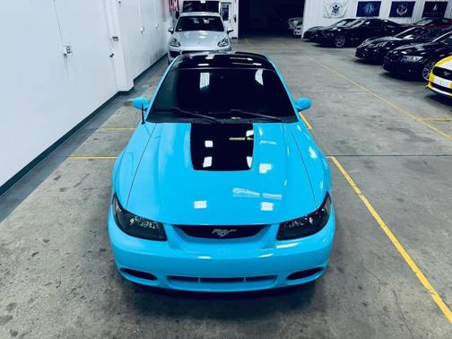 Carolina Blue wrap 2004 Ford Mustang GT