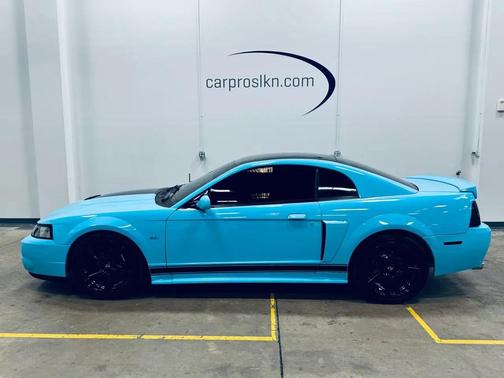 Carolina Blue wrap 2004 Ford Mustang GT