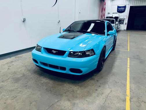 Carolina Blue wrap 2004 Ford Mustang GT