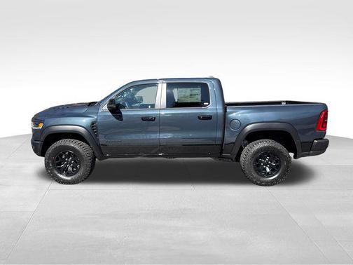 Forged Blue Metallic 2026 RAM 1500 RHO Crew Cab 4x4 5'7' Box