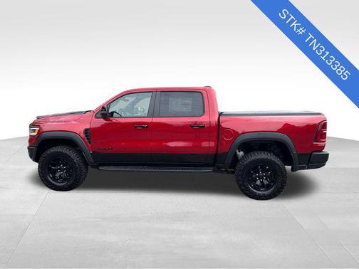 Molten Red Pearlcoat 2026 RAM 1500 RHO Crew Cab 4x4 5'7' Box