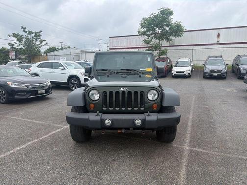 Green 2010 Jeep Wrangler Unlimited Sport