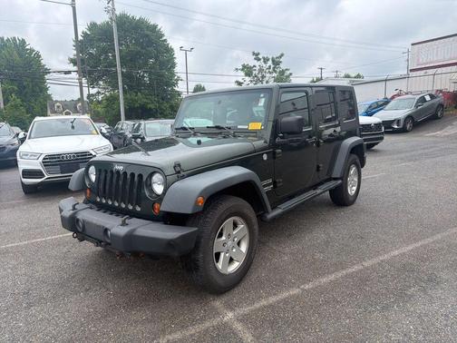 Green 2010 Jeep Wrangler Unlimited Sport