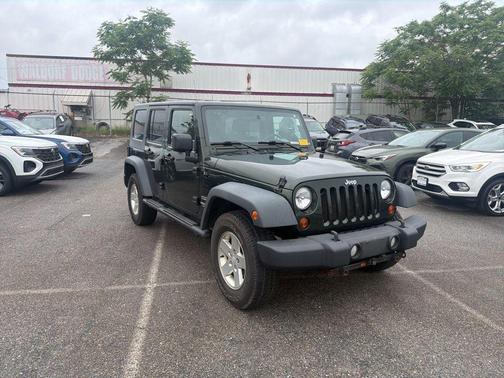 Green 2010 Jeep Wrangler Unlimited Sport