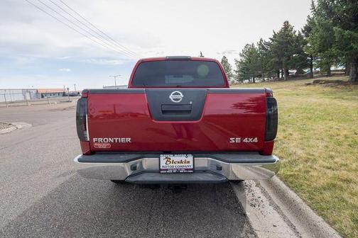 Red Brick 2010 Nissan Frontier SE
