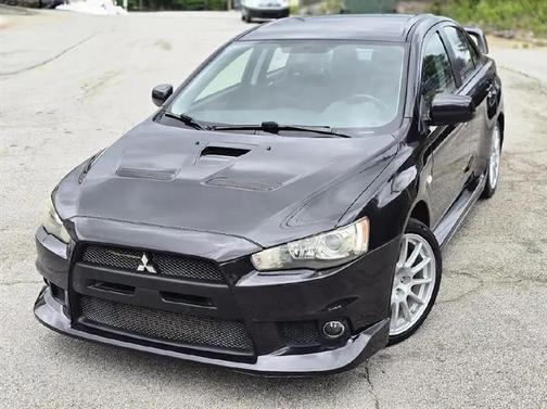 BROWN 2010 Mitsubishi Lancer Evolution GSR