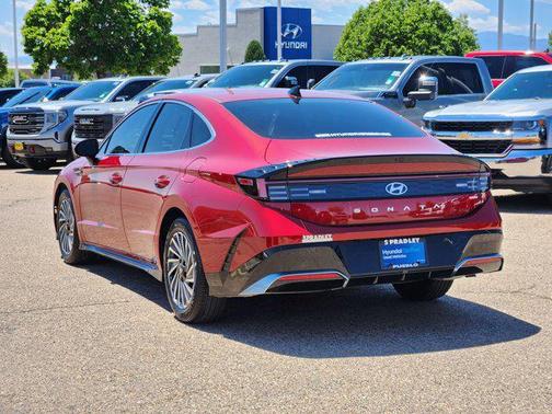 Ultimate red 2025 Hyundai SONATA Hybrid SE