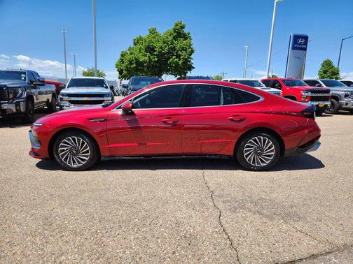 Ultimate red 2025 Hyundai SONATA Hybrid SE