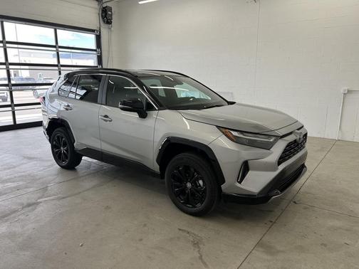 Silver Sky Metallic/Midnight Black Metallic 2024 Toyota RAV4 Hybrid SE