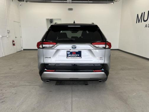 Silver Sky Metallic/Midnight Black Metallic 2024 Toyota RAV4 Hybrid SE