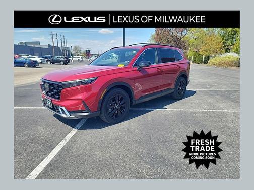 Radiant Red Metallic 2025 Honda CR-V Hybrid Sport Touring AWD