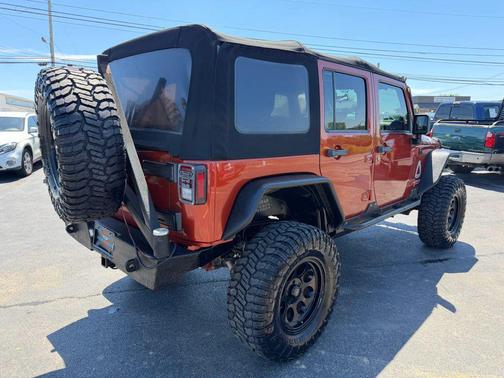 Orange 2014 Jeep Wrangler Unlimited Sport