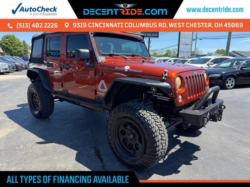 Orange 2014 Jeep Wrangler Unlimited Sport