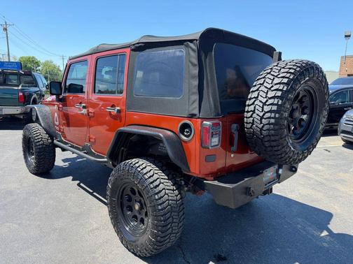 Orange 2014 Jeep Wrangler Unlimited Sport