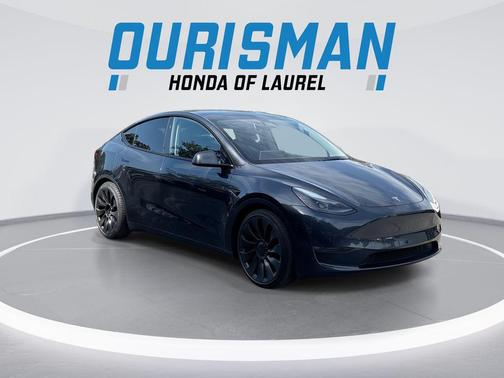 Gray 2025 Tesla Model Y Performance Dual Motor All-Wheel Drive
