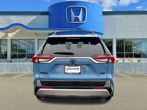 Cavalry Blue/Midnight Black Metallic 2025 Toyota RAV4 Hybrid SE