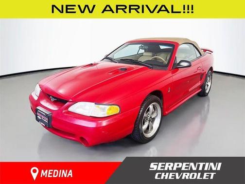 Red 1997 Ford Mustang SVT Cobra