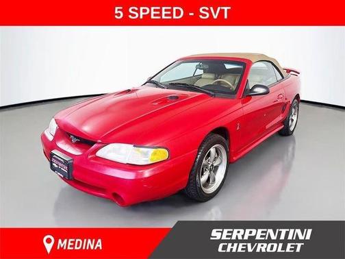 Red 1997 Ford Mustang SVT Cobra