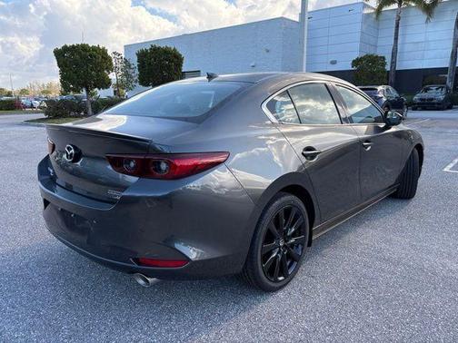 Machine Gray Metallic 2026 Mazda Mazda3 AWD w/Premium Package