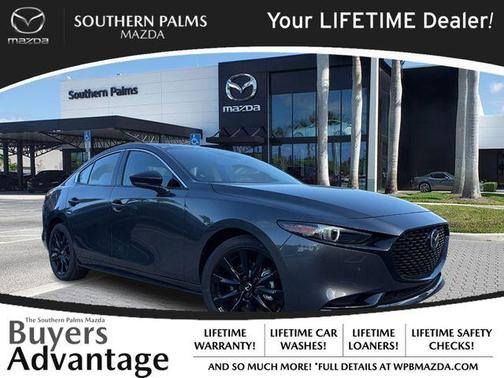 Machine Gray Metallic 2026 Mazda Mazda3 AWD w/Premium Package