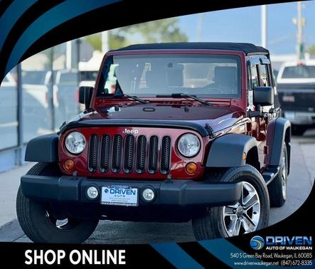 Red Rock Crystal Pearl 2010 Jeep Wrangler Unlimited Sport
