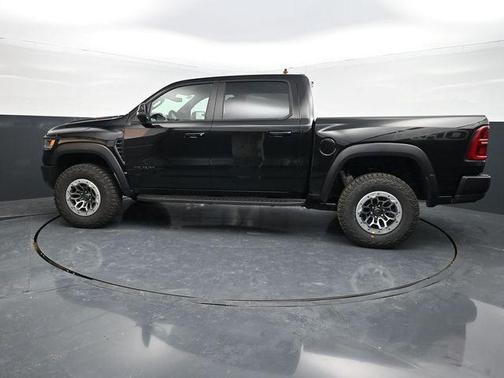 Diamond Black Crystal Pearlcoat 2026 RAM 1500 RHO Crew Cab 4x4 5'7' Box