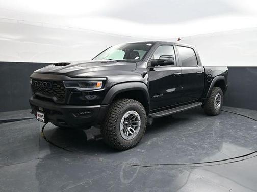 Diamond Black Crystal Pearlcoat 2026 RAM 1500 RHO Crew Cab 4x4 5'7' Box
