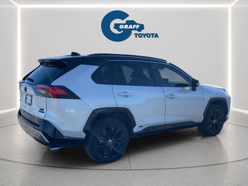 Wind Chill Pearl/Midnight Black Metallic 2023 Toyota RAV4 Hybrid SE