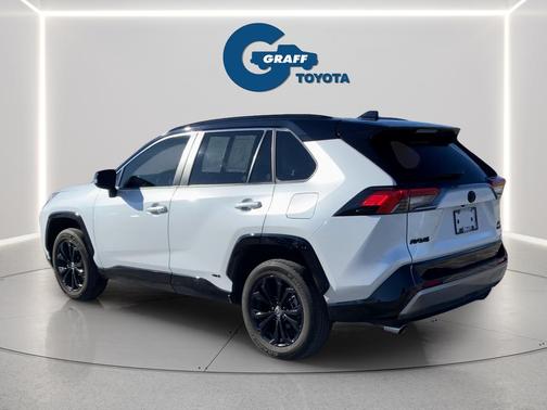 Wind Chill Pearl/Midnight Black Metallic 2023 Toyota RAV4 Hybrid SE