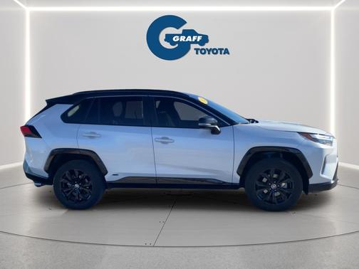 Wind Chill Pearl/Midnight Black Metallic 2023 Toyota RAV4 Hybrid SE