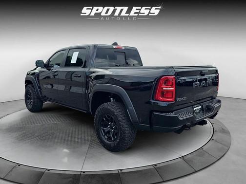 Diamond Black Crystal Pearlcoat 2026 RAM 1500 RHO Crew Cab 4x4 5'7' Box