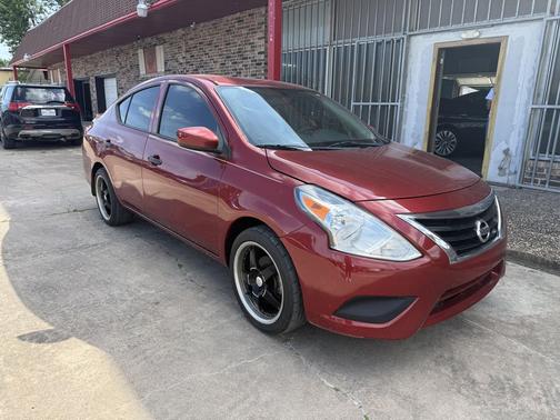 Red 2018 Nissan Versa 1.6 S+