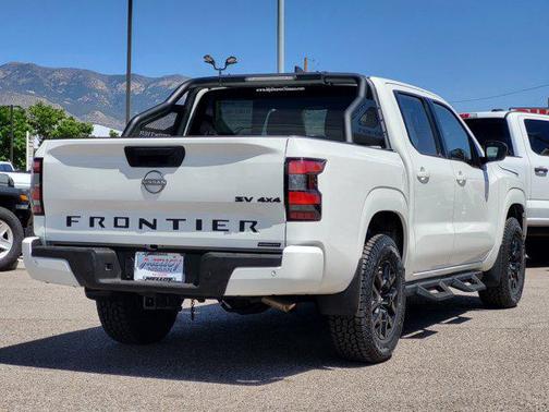 Glacier White 2023 Nissan Frontier SV