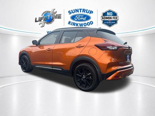 Monarch Orange / Super Black 2023 Nissan Kicks SR