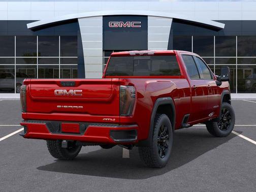 Volcanic Red Tintcoat 2026 GMC Sierra 3500 AT4