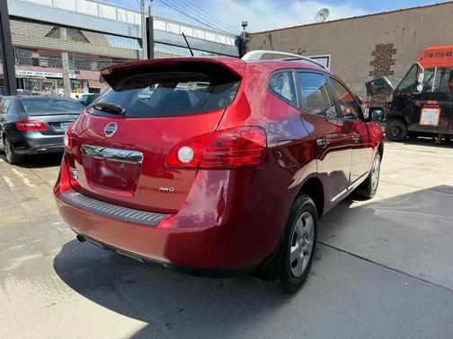 Red 2015 Nissan Rogue Select S