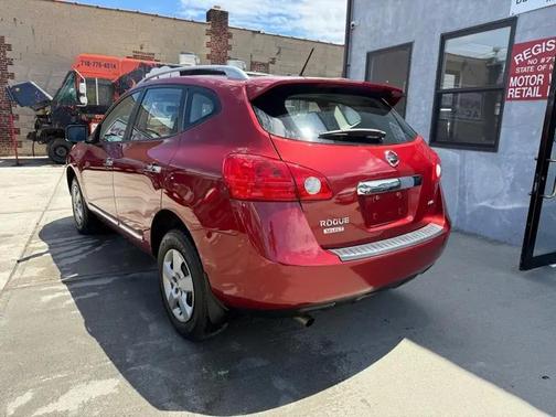 Red 2015 Nissan Rogue Select S