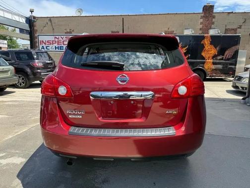 Red 2015 Nissan Rogue Select S